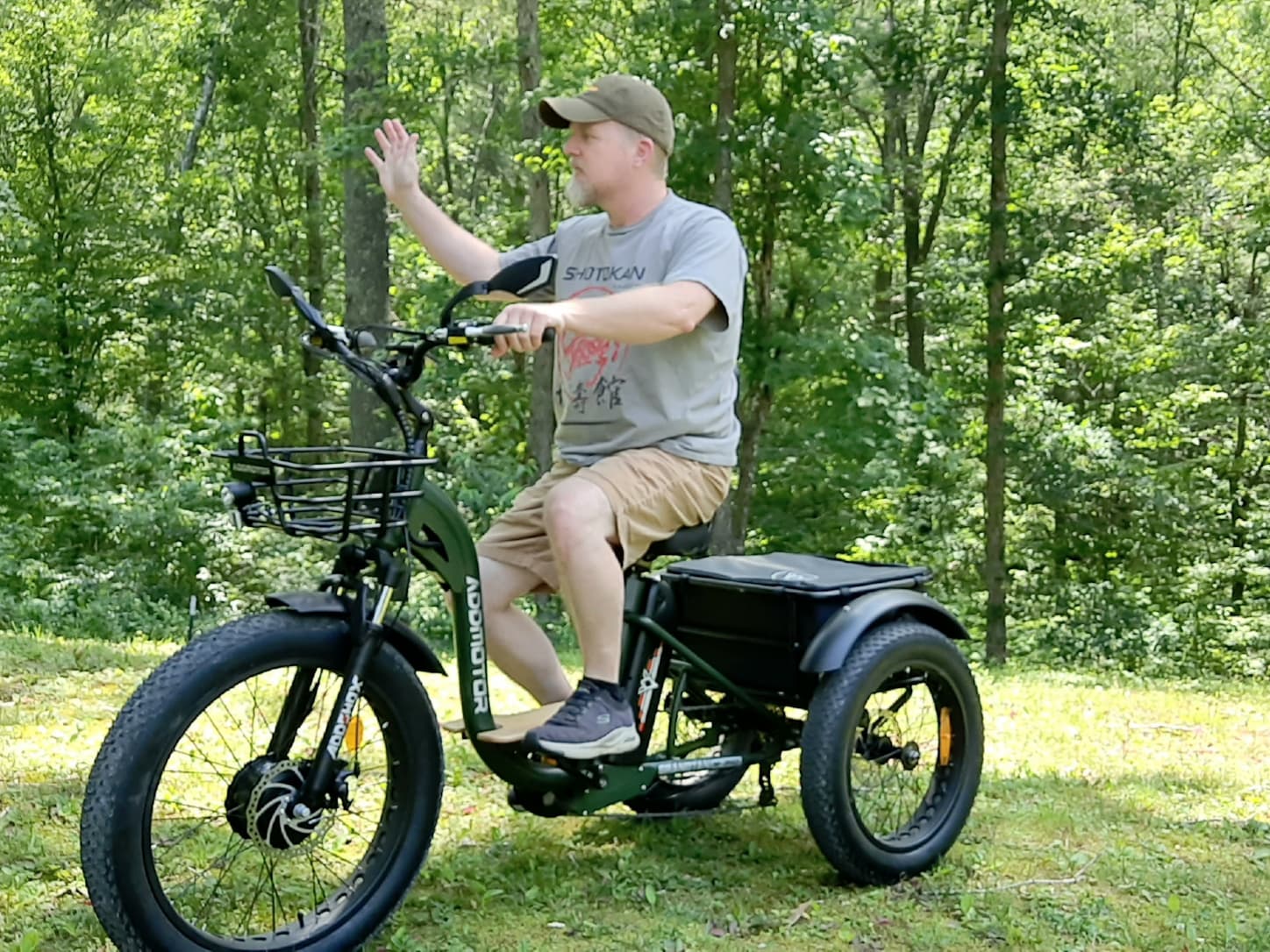 a man is riding a fat tire electric trike